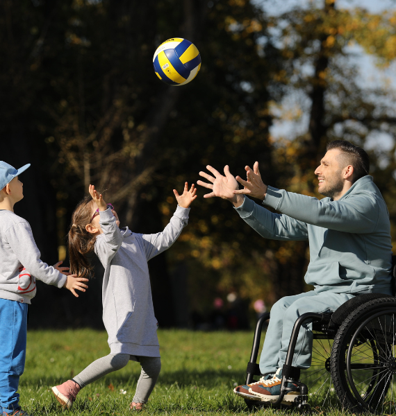 Omobic go far Lukasz with challenger wheelchair wheels playing in a park
