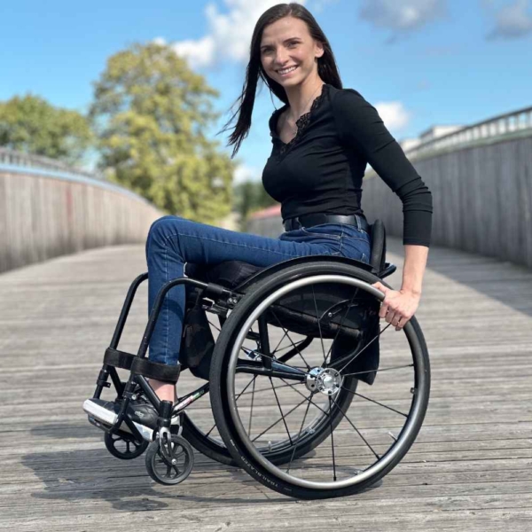 Ania with Omobic Traiblazer and Titanium pushrim