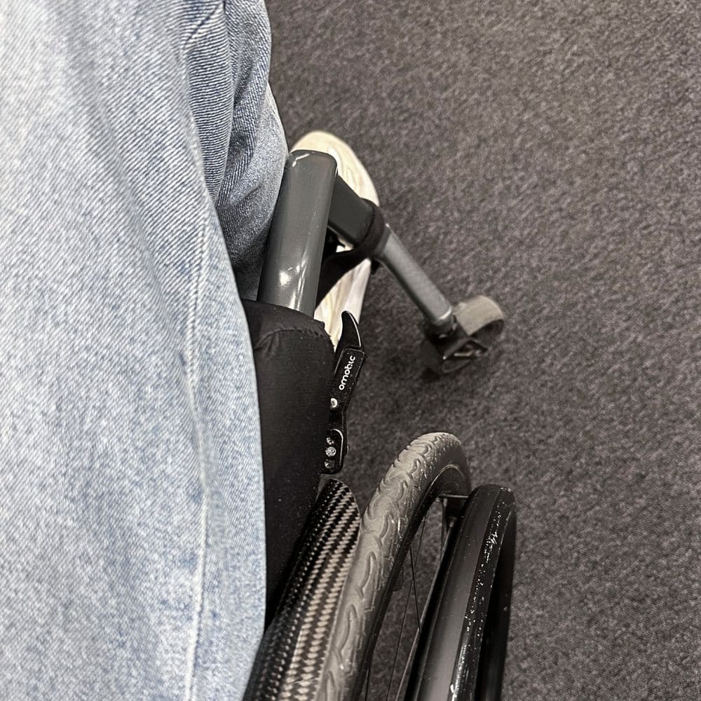 Scissor wheelchair lock hidden under the frame.